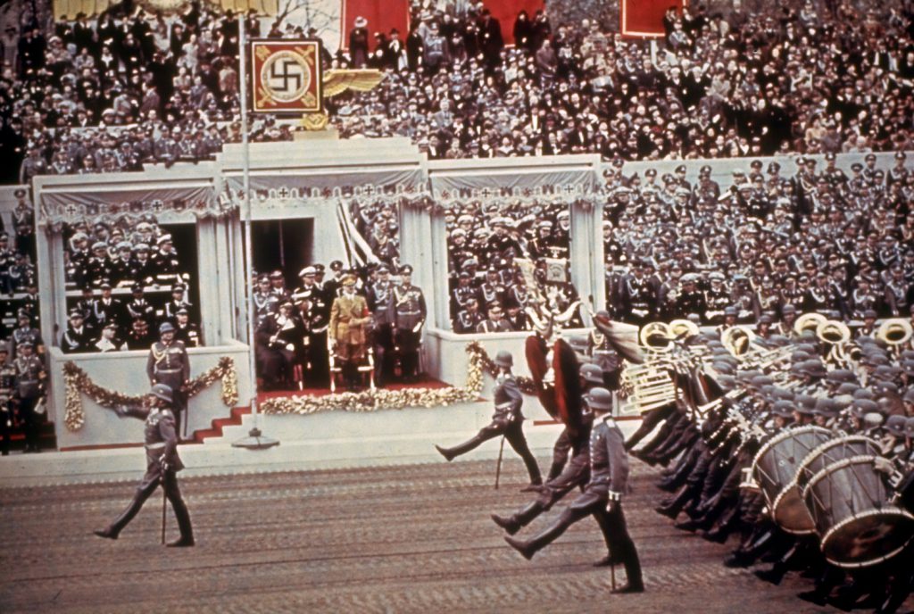 German troops goose-step past the reviewing stand during a massive rally and military parade in celebration of Adolf Hitler's 50th birthdayBerlin, April 20, 1939.