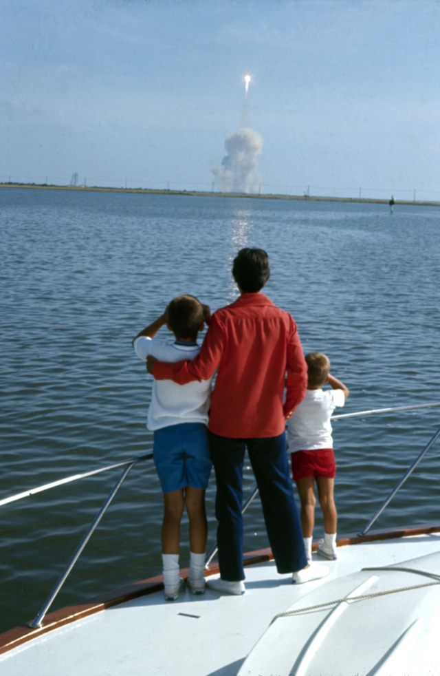 Jan Armstrong, wife of Apollo 11 astronaut Neil Armstrong, watches the liftoff with her sons, July 16, 1969.